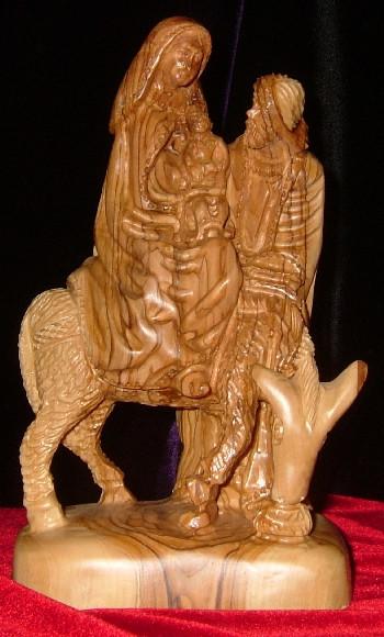 Hand Carved Olive Wood Statue: Joseph next to Mary and Jesus on a Donkey (Flight to Egypt)